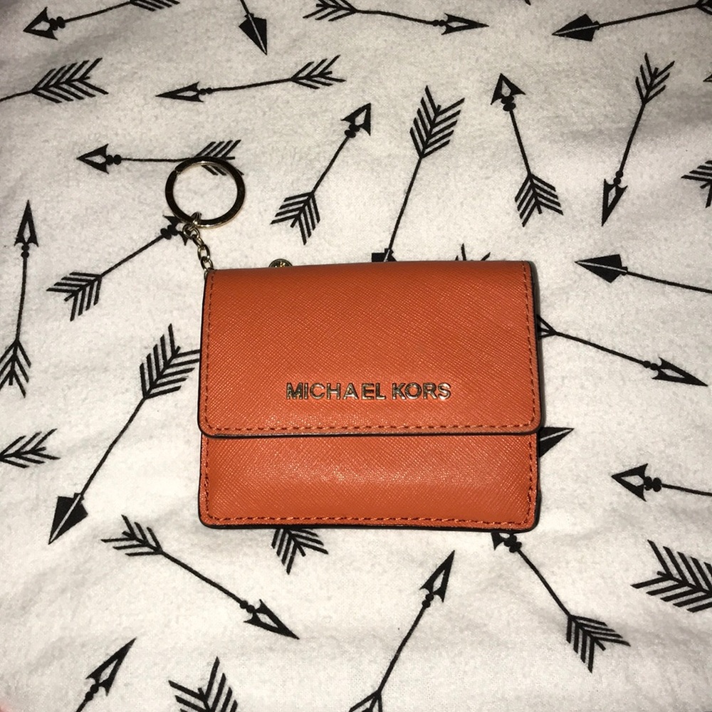 Orange Michael Kors keychain wallet